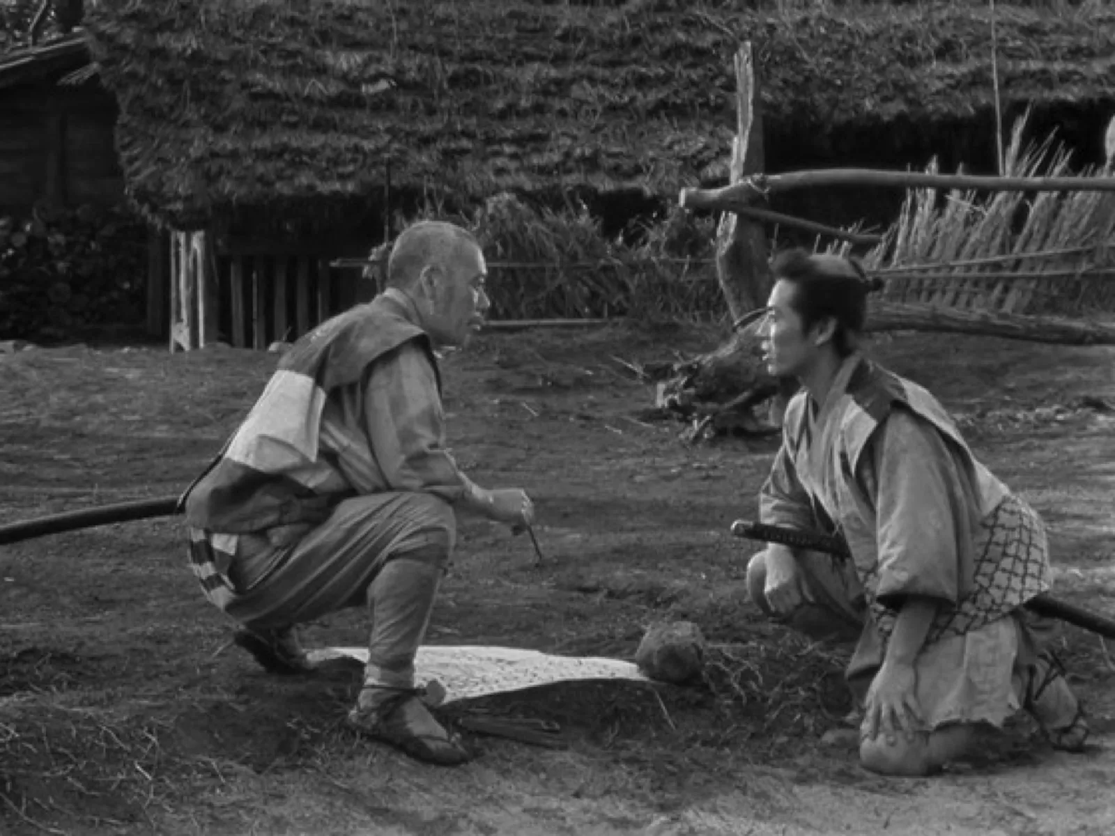 A tense negotiation scene from Akira Kurosawa's Seven Samurai (1954)